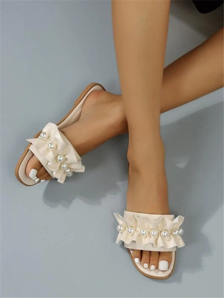 Ruffle store slide sandals